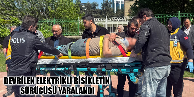 DEVRİLEN ELEKTRİKLİ BİSİKLETİN SÜRÜCÜSÜ YARALANDI